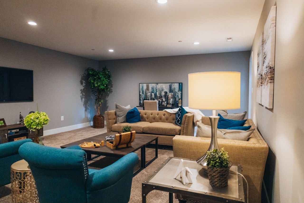 Luxurious living room with contemporary furniture and warm ambiance.